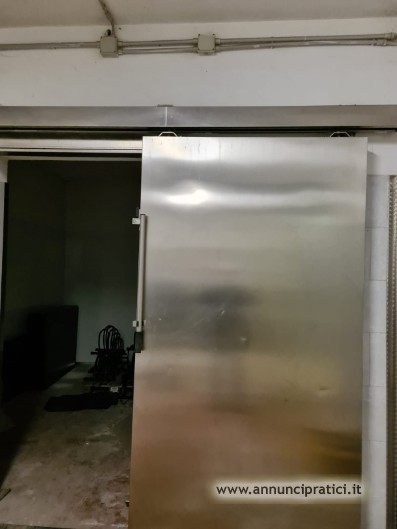 PORTA SCORREVOLE IN ACCIAIO INOX